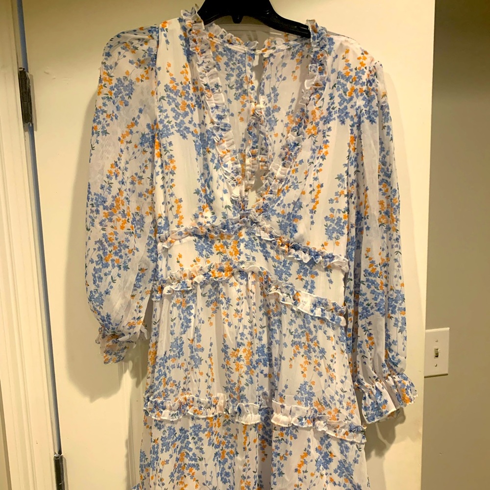 Tiered floral dress, never worn. Deep v and open back